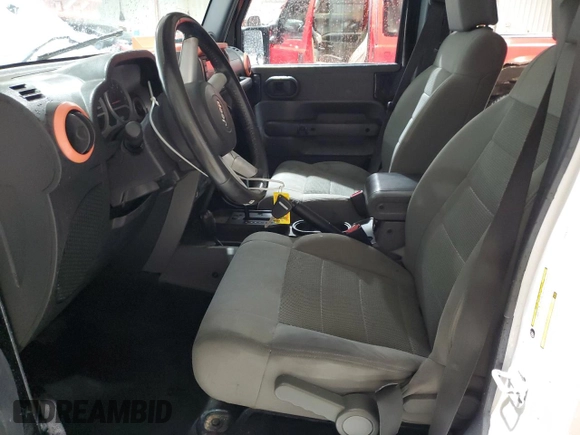 2008 Jeep Wrangler Unlimited Sahara с VIN 1J8GA59108L514034, выставлен на аукционе Copart как лот 58812215 с пробегом 191 800 миль миль и Списание • Salvage title. История ставок и продаж доступна на DreamBid. Изображение 7.