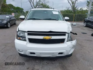 2014 Chevrolet Suburban LT with VIN 1GNSCJE06ER231476, listed as a IAAI auction lot 41768616 with 88,581 mi miles. Bid and sale history available at carsss.com. Image 12.