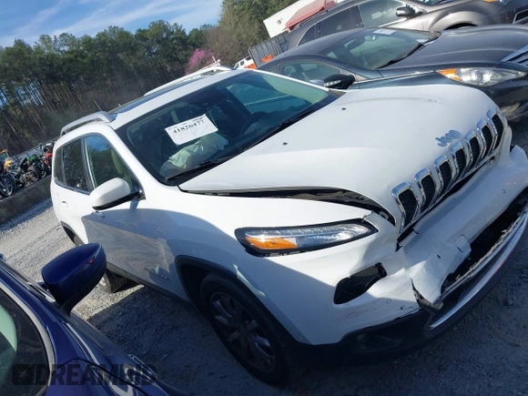 2015 Jeep Cherokee Limited with VIN 1C4PJLDB9FW677367, listed as a IAAI auction lot 41826477 with 125,648 mi miles and . Bid and sale history available at DreamBid. Image 13.