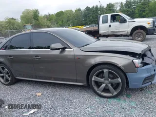 2014 Audi A4 Premium Plus z VIN WAUFFAFL7EN006692, wystawiony jako IAAI lot #42354027 z przebiegiem 99 560 mil mil oraz . Historia ofert i sprzedaży dostępna na DreamBid. Obrazek 13.