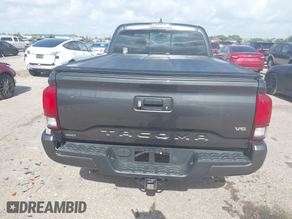 2018 Toyota Tacoma SR5 with VIN 3TMDZ5BN0JM051283, listed as a IAAI auction lot 42438690 with 106,155 mi miles and . Bid and sale history available at DreamBid. Image 16.