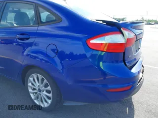 2014 Ford Fiesta SE with VIN 3FADP4BJ5EM190009, listed as a IAAI auction lot 42036976 with 157,575 mi miles. Bid and sale history available at carsss.com. Image 16.
