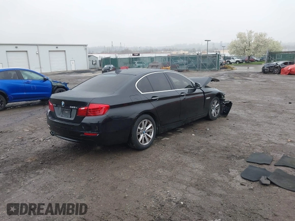 2016 BMW 5 Series 528i xDrive with VIN WBA5A7C53GG149942, listed as a IAAI auction lot 41985753 with 115,200 mi miles. Bid and sale history available at carsss.com. Image 4.