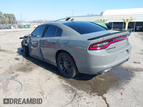 2019 Dodge Charger SXT with VIN 2C3CDXJG1KH537825, listed as a IAAI auction lot 41482387 with 71,062 mi miles and . Bid and sale history available at DreamBid. Image 3.