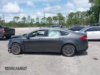 2018 Ford Fusion Titanium with VIN 3FA6P0D9XJR169657, listed as a IAAI auction lot 42392112 with 62,754 mi miles and . Bid and sale history available at DreamBid. Image 15.