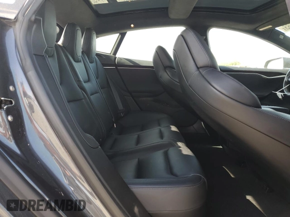 2018 Tesla Model S 75D z VIN 5YJSA1E23JF263642, wystawiony jako Copart lot #50647665 z przebiegiem 71 416 mil mil oraz Szkoda całkowita • Salvage title. Historia ofert i sprzedaży dostępna na DreamBid. Obrazek 10.
