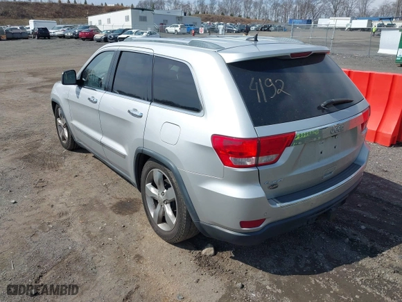 2012 Jeep Grand Cherokee Overland with VIN 1C4RJFCGXCC292257, listed as a IAAI auction lot 41844192 with 182,522 mi miles. Bid and sale history available at carsss.com. Image 3.