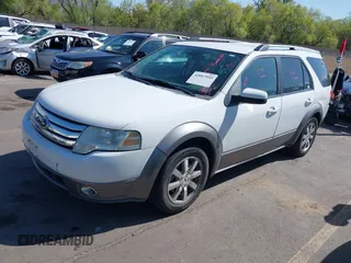 2008 Ford Taurus X SEL with VIN 1FMDK05W98GA41945, listed as a IAAI auction lot 42067959 with 157,896 mi miles and . Bid and sale history available at DreamBid. Image 2.