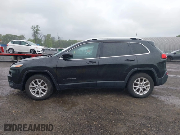 2016 Jeep Cherokee Latitude with VIN 1C4PJMCS6GW221075, listed as a IAAI auction lot 42259107 with 115,912 mi miles and . Bid and sale history available at DreamBid. Image 14.