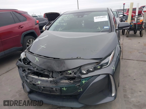 2018 Toyota Prius Plus with VIN JTDKARFPXJ3087064, listed as a IAAI auction lot 41433495 with 118,298 mi miles and . Bid and sale history available at DreamBid. Image 12.