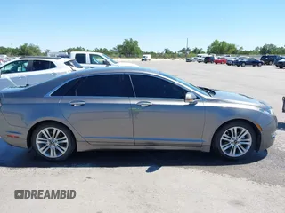 2014 Lincoln MKZ Hybrid с VIN 3LN6L2LU8ER822396, выставлен на аукционе IAAI как лот 42094086 с пробегом 166 203 миль миль и . История ставок и продаж доступна на DreamBid. Изображение 13.