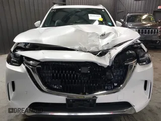 2024 Mazda CX-90 S Premium z VIN JM3KKDHCXR1103272, wystawiony jako IAAI lot #40301969 z przebiegiem 5 235 mil mil oraz . Historia ofert i sprzedaży dostępna na DreamBid. Obrazek 13.