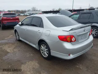 2010 Toyota Corolla with VIN 2T1BU4EEXAC432515, listed as a IAAI auction lot 42019459 with 267,404 mi miles. Bid and sale history available at carsss.com. Image 3.