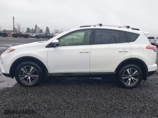 2017 Toyota RAV4 XLE with VIN JTMRFREV2HD212188, listed as a IAAI auction lot 41216790 with 79,594 mi miles. Bid and sale history available at carsss.com. Image 15.