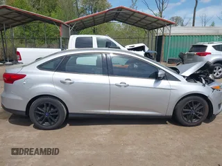 2016 Ford Focus SE with VIN 1FADP3F23GL373801, listed as a IAAI auction lot 42083360 with 52,993 mi miles and . Bid and sale history available at DreamBid. Image 13.