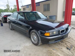 1997 BMW 7 Series 740il with VIN WBAGJ8324VDL43320, listed as a IAAI auction lot 41990660 with 193,998 mi miles. Bid and sale history available at carsss.com. Image 1.
