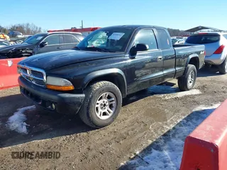 2004 Dodge Dakota Sport with VIN 1D7HG32N24S518815, listed as a IAAI auction lot 41408182 with 267,160 mi miles. Bid and sale history available at carsss.com. Image 2.