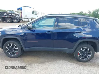 2021 Jeep Compass Trailhawk with VIN 3C4NJDDB0MT590442, listed as a IAAI auction lot 42543530 with 66,669 mi miles and . Bid and sale history available at DreamBid. Image 14.