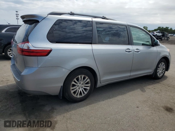 2015 Toyota Sienna XLE with VIN 5TDYK3DC2FS529006, listed as a Copart auction lot 62750995 with 142,990 mi miles and Salvage title. Bid and sale history available at DreamBid. Image 3.