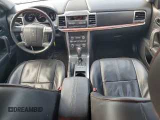 2012 Lincoln MKZ z VIN 3LNHL2GC4CR800578, wystawiony jako Copart lot #58409215 z przebiegiem 49 423 mil mil oraz Szkody całkowita. Historia ofert i sprzedaży dostępna na DreamBid. Obrazek 8.