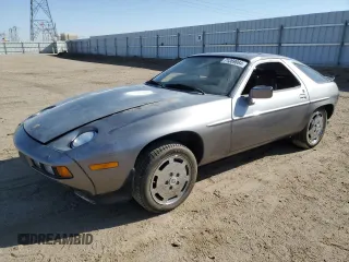 1985 Porsche 928 z VIN WP0JB0927FS862258, wystawiony jako Copart lot #71369064 z przebiegiem 32 896 mil mil oraz Szkody całkowita. Historia ofert i sprzedaży dostępna na DreamBid. Obrazek 1.