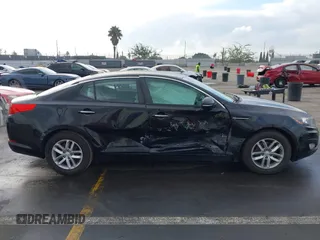 2013 Kia Optima LX z VIN 5XXGM4A74DG221272, wystawiony jako IAAI lot #41470828 z przebiegiem 76 452 mil mil oraz . Historia ofert i sprzedaży dostępna na DreamBid. Obrazek 13.