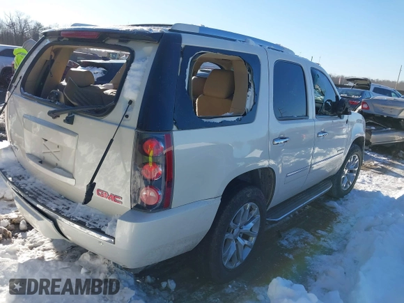 2014 GMC Yukon Denali with VIN 1GKS2EEF3ER181504, listed as a IAAI auction lot 41267224 with 165,478 mi miles. Bid and sale history available at carsss.com. Image 4.