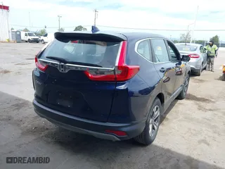 2017 Honda CR-V LX with VIN 7FARW5H39HE015356, listed as a IAAI auction lot 42028467 with 149,785 mi miles. Bid and sale history available at carsss.com. Image 4.