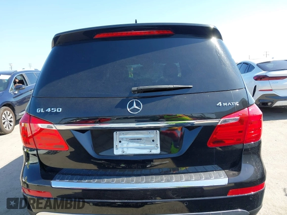 2014 Mercedes-Benz GL 450 with VIN 4JGDF7CE7EA414390, listed as a IAAI auction lot 42554915 with 114,997 mi miles and . Bid and sale history available at DreamBid. Image 16.
