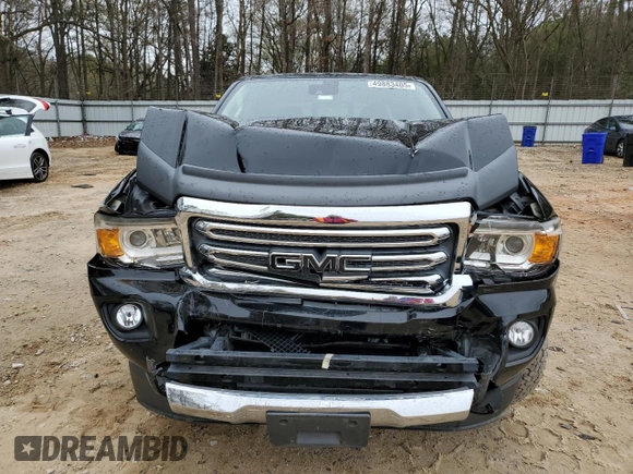 2020 GMC Canyon 4WD SLT with VIN 1GTG6DEN4L1130421, listed as a Copart auction lot 49883405 with 49,142 mi miles and Salvage Title. Bid and sale history available at carsss.com. Image 5.
