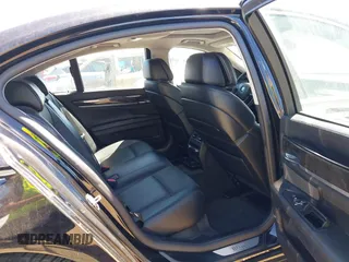 2012 BMW 7 Series 750i with VIN WBAKA8C50CCY37892, listed as a IAAI auction lot 42080313 with 148,058 mi miles. Bid and sale history available at carsss.com. Image 8.