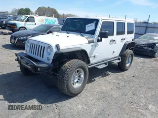 2014 Jeep Wrangler Unlimited Sahara with VIN 1C4BJWEG6EL203866, listed as a IAAI auction lot 41846091 with 105,296 mi miles. Bid and sale history available at carsss.com. Image 19.