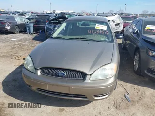2004 Ford Taurus SE with VIN 1FAFP532X4G152810, listed as a IAAI auction lot 41639876 with 98,718 mi miles and . Bid and sale history available at DreamBid. Image 12.