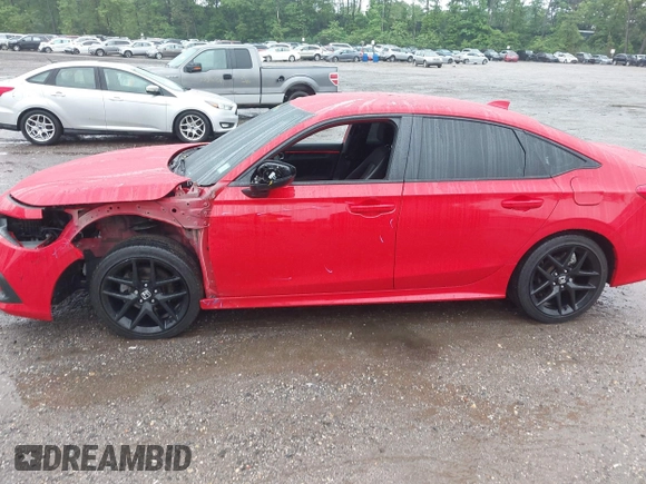 2022 Honda Civic Sport z VIN 2HGFE2F51NH605045, wystawiony jako IAAI lot #42352645 z przebiegiem 28 151 mil mil oraz . Historia ofert i sprzedaży dostępna na DreamBid. Obrazek 14.
