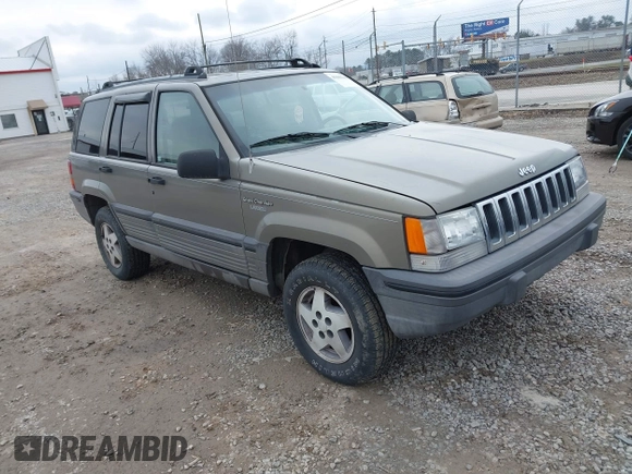 1995 Jeep Grand Cherokee Laredo with VIN 1J4GZ58S4SC555309, listed as a IAAI auction lot 41600141 with 130,493 mi miles. Bid and sale history available at carsss.com. Image 1.