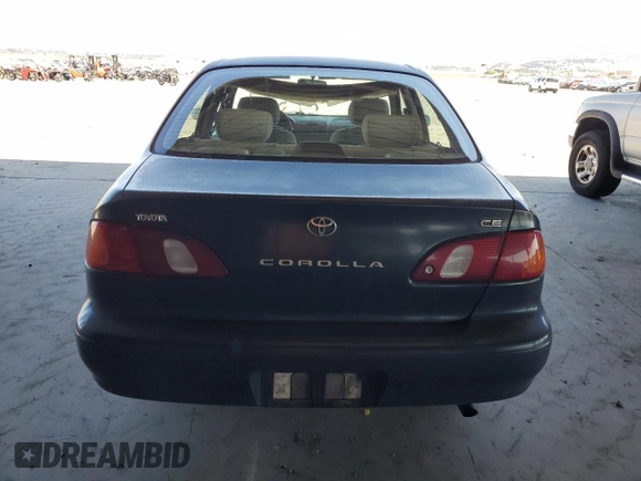 1999 Toyota Corolla VE z VIN 1NXBR12E6XZ286383, wystawiony jako Copart lot #64007215 z przebiegiem 176 069 mil mil oraz Czysty tytuł • Clean title. Historia ofert i sprzedaży dostępna na DreamBid. Obrazek 6.