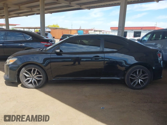 2014 Scion tC z VIN JTKJF5C75E3069757, wystawiony jako IAAI lot #42175725 z przebiegiem 191 054 mil mil oraz . Historia ofert i sprzedaży dostępna na DreamBid. Obrazek 14.