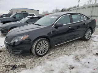 2015 Lincoln MKS with VIN 1LNHL9EK3FG606977, listed as a Copart auction lot 44195545 with 101,577 mi miles and Clean title. Bid and sale history available at DreamBid. Image 1.