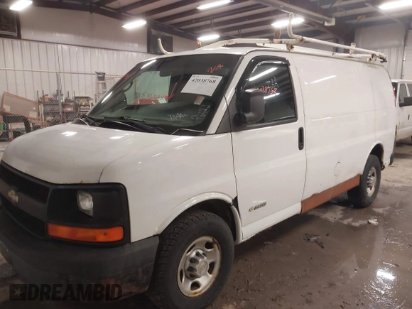 2004 Chevrolet Express Cargo Van with VIN 1GCGG25U641135906, listed as a IAAI auction lot 42038768 with 129,677 mi miles. Bid and sale history available at carsss.com. Image 2.