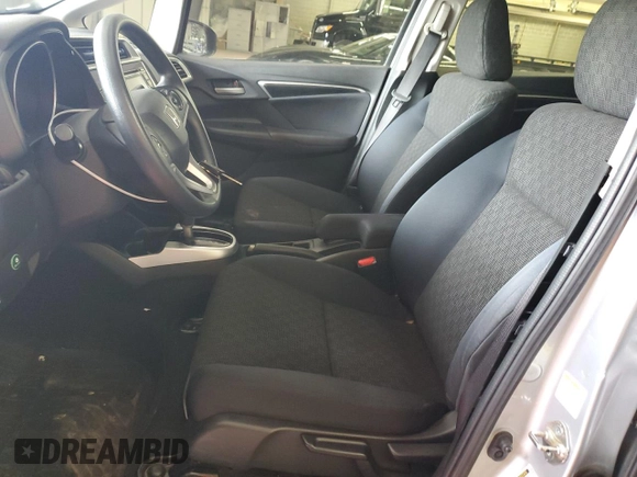 2016 Honda Fit LX with VIN JHMGK5H50GX005947, listed as a Copart auction lot 57699275 with 103,698 mi miles and Salvage title. Bid and sale history available at DreamBid. Image 7.