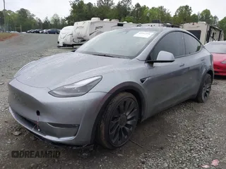 2024 Tesla Model Y Performance with VIN 7SAYGDEF2RA322351, listed as a IAAI auction lot 41953896 with 8,959 mi miles and . Bid and sale history available at carsss.com. Image 2.