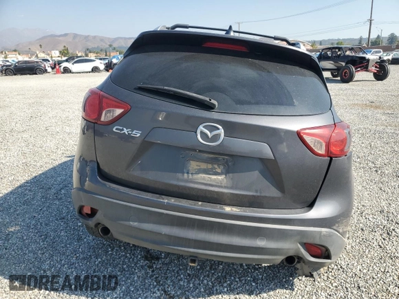 2014 Mazda CX-5 Touring with VIN JM3KE4CY6E0375084, listed as a Copart auction lot 46344065 with 143,828 mi miles and Salvage Title. Bid and sale history available at carsss.com. Image 6.