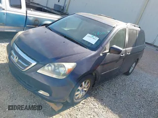 2007 Honda Odyssey Touring with VIN 5FNRL38807B023395, listed as a IAAI auction lot 42047062 with 240,552 mi miles. Bid and sale history available at carsss.com. Image 2.