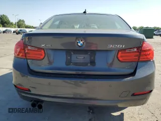 2013 BMW 3 Series 328i xDrive z VIN WBA3B3C5XDF533439, wystawiony jako Copart lot #62130615 z przebiegiem 125 712 mil mil oraz Szkoda całkowita • Salvage title. Historia ofert i sprzedaży dostępna na DreamBid. Obrazek 6.
