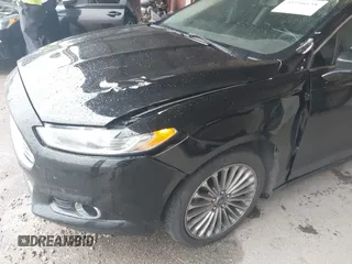 2014 Ford Fusion Titanium with VIN 3FA6P0K99ER235785, listed as a IAAI auction lot 41946638 with 212,939 mi miles and . Bid and sale history available at DreamBid. Image 6.