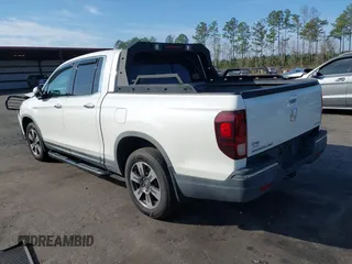 2018 Honda Ridgeline RTL-E with VIN 5FPYK3F71JB001753, listed as a IAAI auction lot 41510248 with 84,551 mi miles and . Bid and sale history available at DreamBid. Image 3.