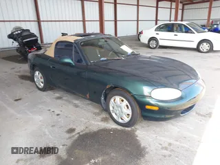 1999 Mazda MX-5 Miata with VIN JM1NB3530X0133971, listed as a IAAI auction lot 42652996 with 19,270 mi miles and . Bid and sale history available at DreamBid. Image 1.
