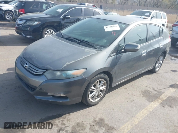 2010 Honda Insight EX with VIN JHMZE2H71AS032532, listed as a IAAI auction lot 41988221 with 333,144 mi miles and . Bid and sale history available at DreamBid. Image 17.