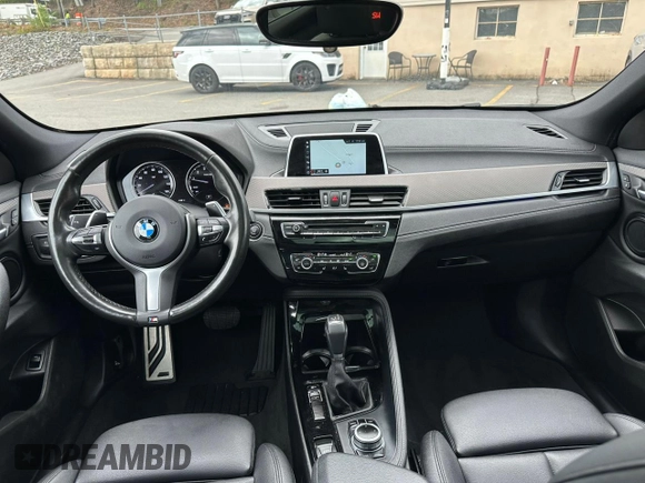 2018 BMW X2 sDrive28i z VIN WBXYJ3C32JEJ75882, wystawiony jako Copart lot #56330835 z przebiegiem 84 609 mil mil oraz Tytuł czysty. Historia ofert i sprzedaży dostępna na DreamBid. Obrazek 8.