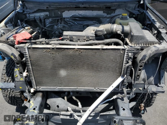 2014 Ford F-150 XL with VIN 1FTFW1CF1EKG32922, listed as a Copart auction lot 61793425 with 142,303 mi miles and Salvage title. Bid and sale history available at DreamBid. Image 11.